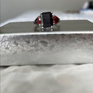 Elegant Silver and Garnet Ring